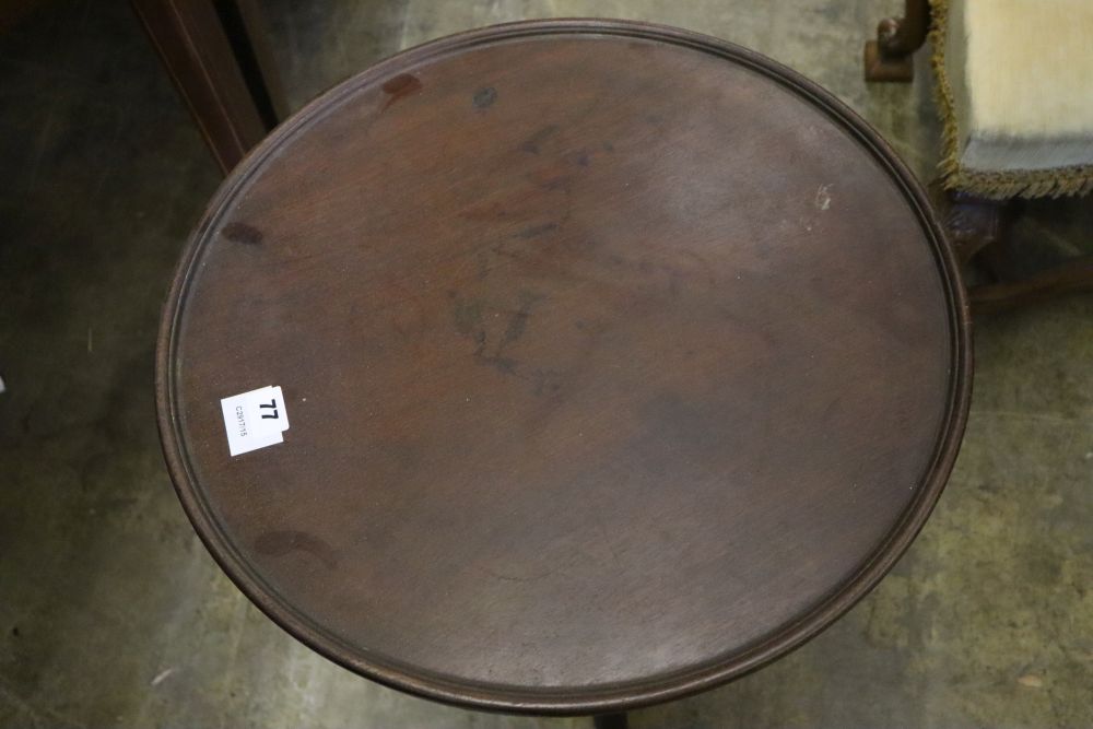 An early 19th century mahogany tripod table, with dished top, width 50cm